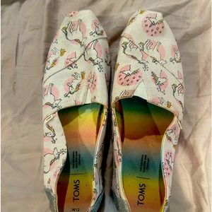 Toms women’s size 12 unicorn slip on shoes.